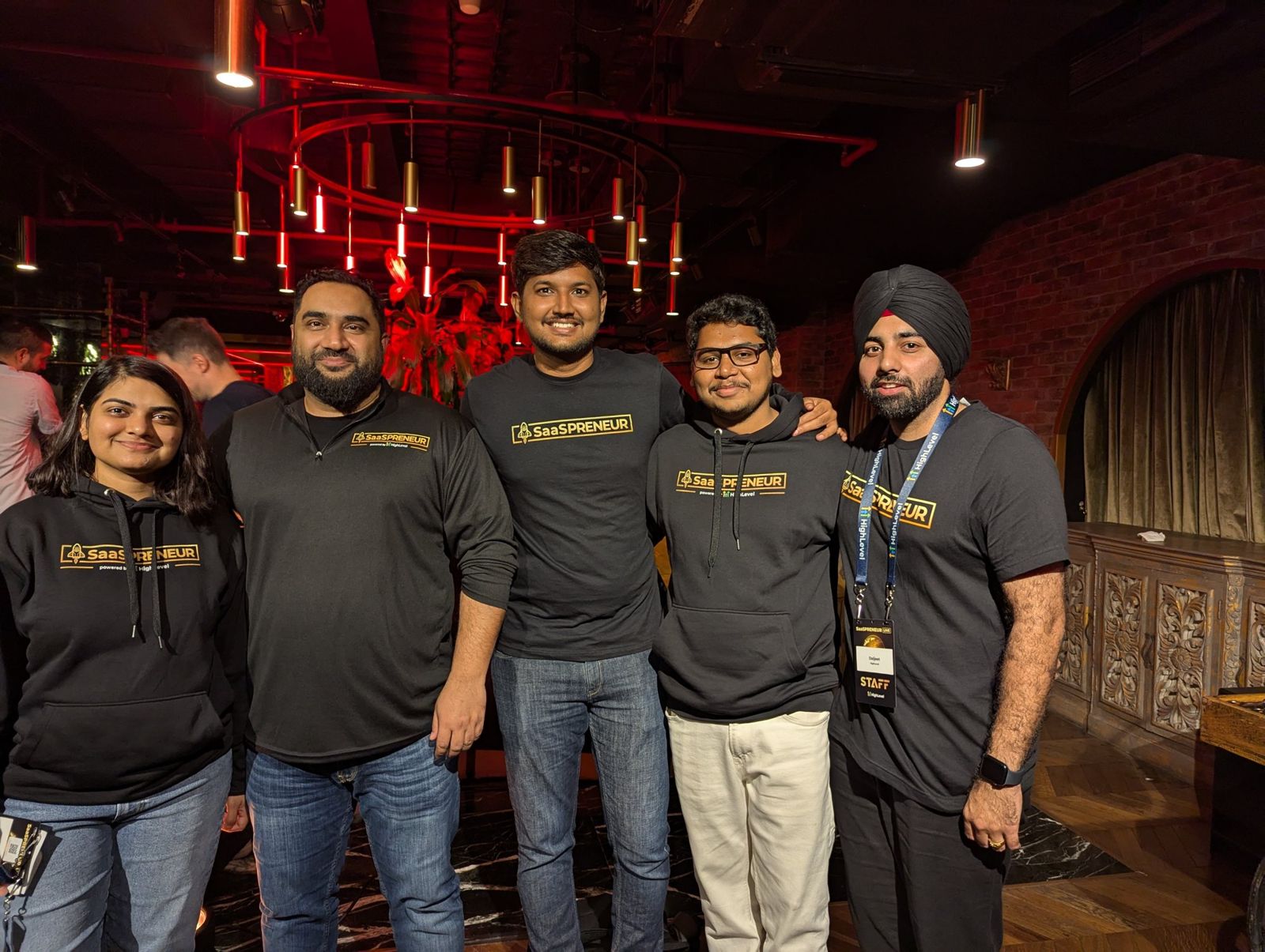 Fer with the SaaSPRENEUR team at night in Dubai